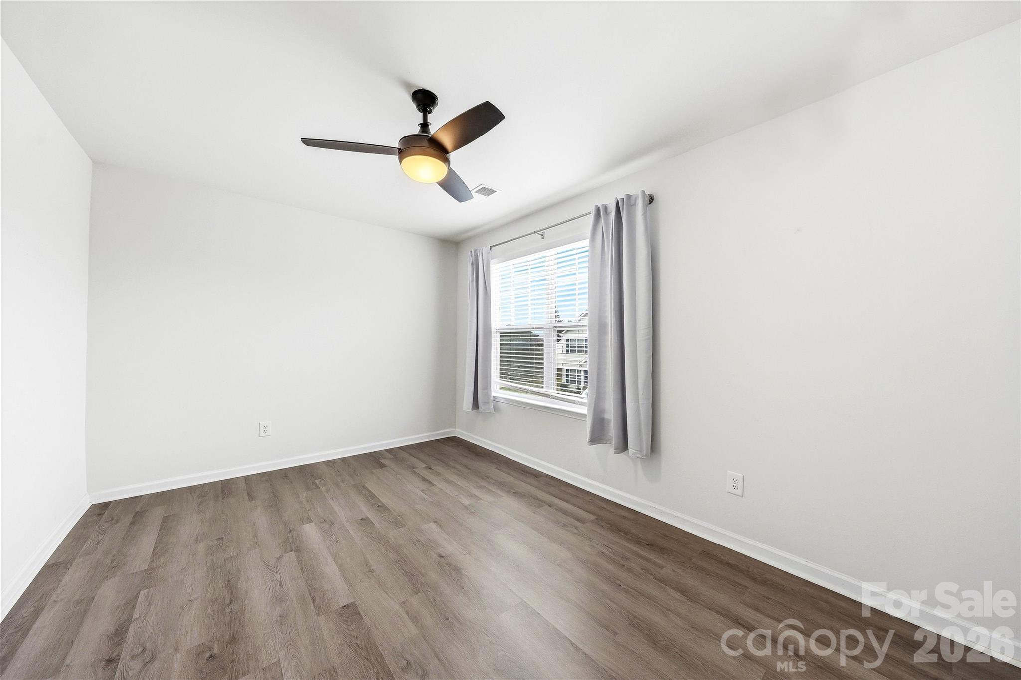 319 Oak Br Road Arden, NC 28704 - Photo 26 of 33 a view of an empty room with a window
