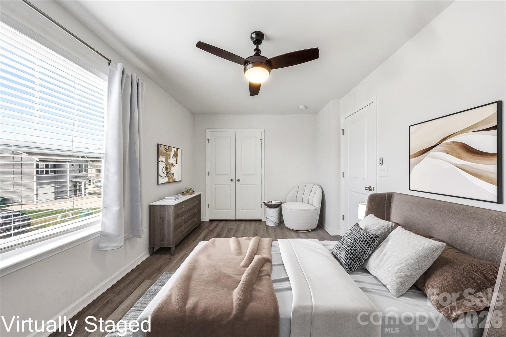 319 Oak Br Road Arden, NC 28704 - Photo 27 of 33 a bedroom with a bed and wooden floor