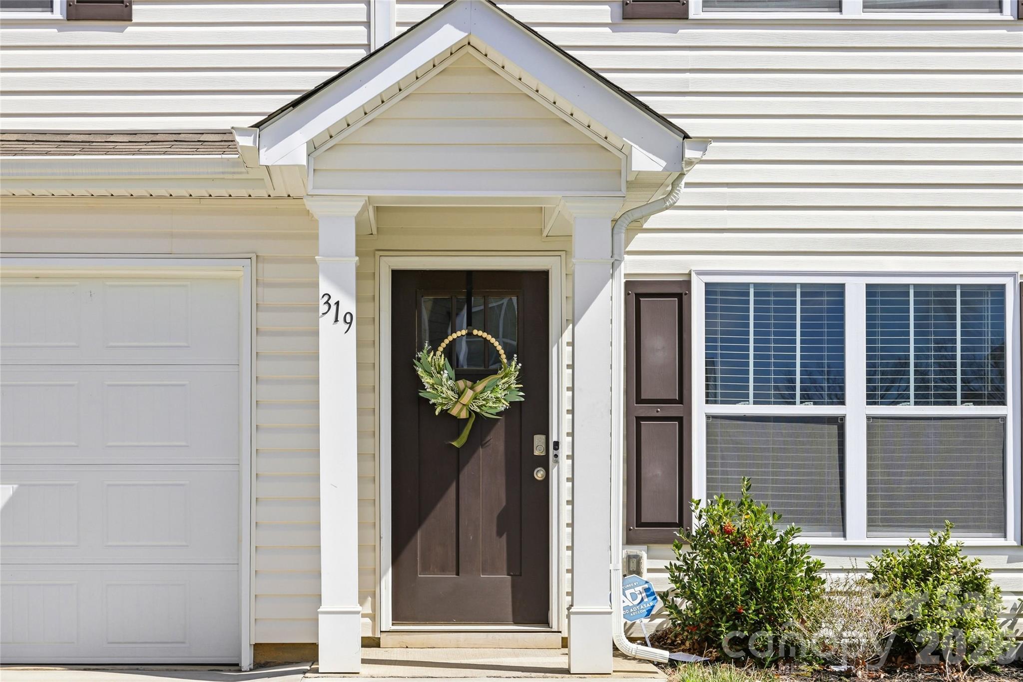 319 Oak Br Road Arden, NC 28704 - Photo 7 of 33 a view of a entryway door front of house