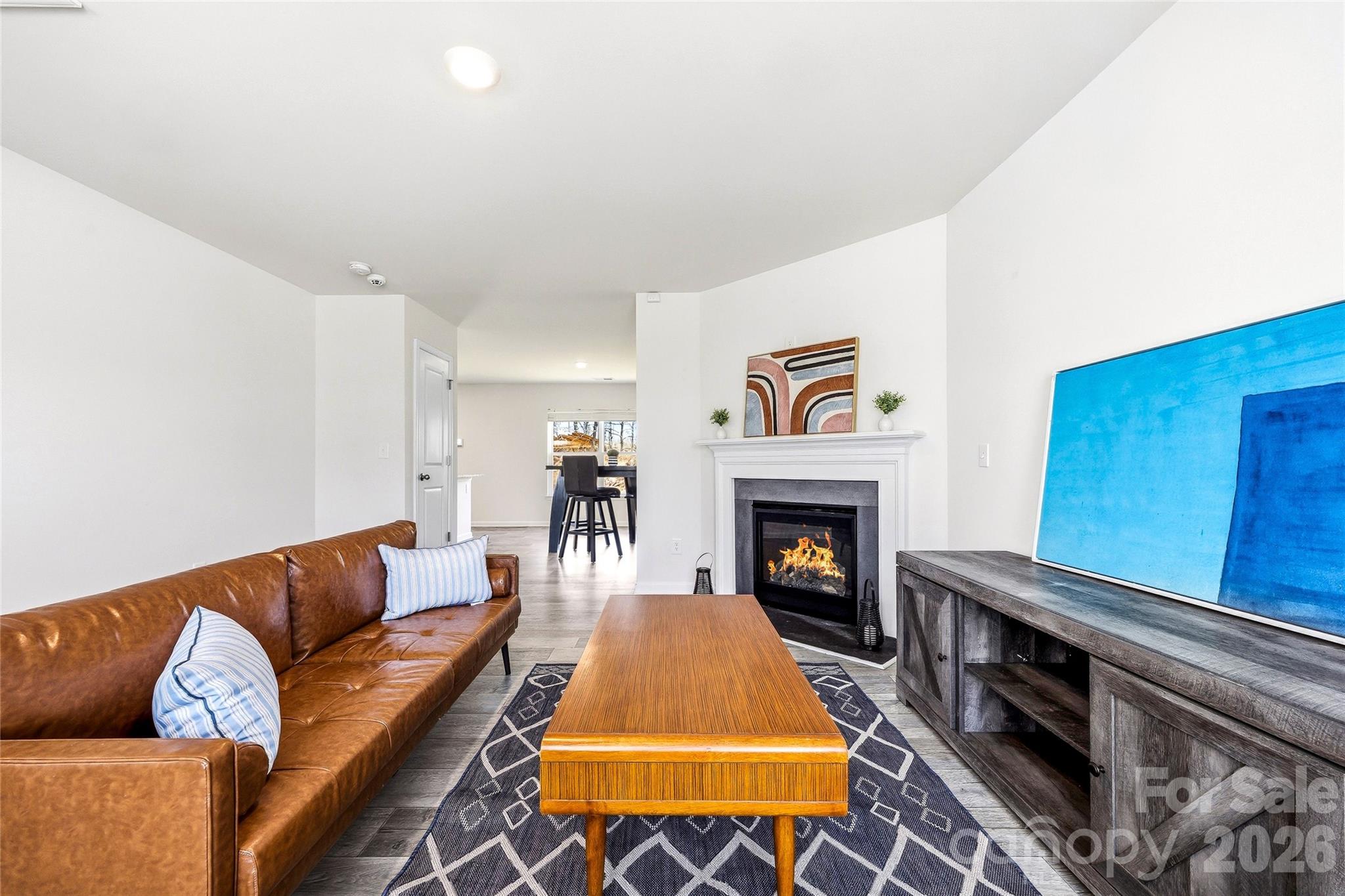 319 Oak Br Road Arden, NC 28704 - Photo 9 of 33 a living room with furniture and a fireplace