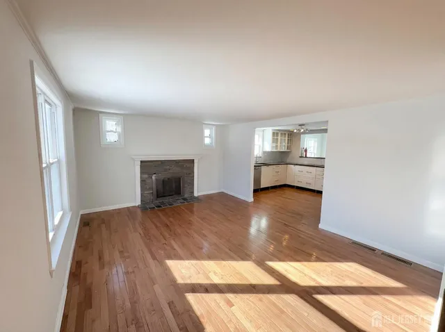 a view of a road with a building in the background