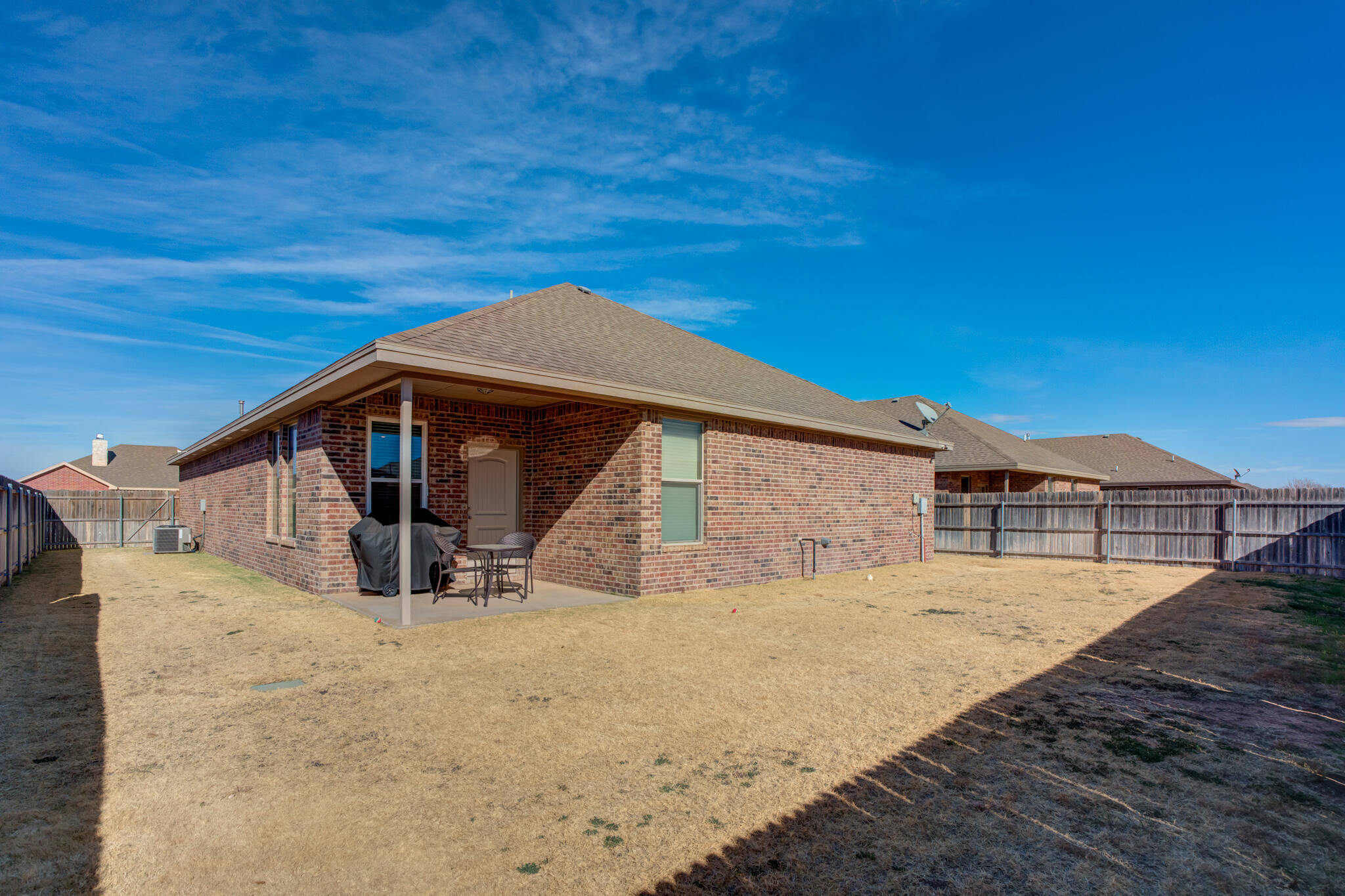 5219 Kemper Street Lubbock, TX 79416 - Photo 38 of 38 a house with trees in the background
