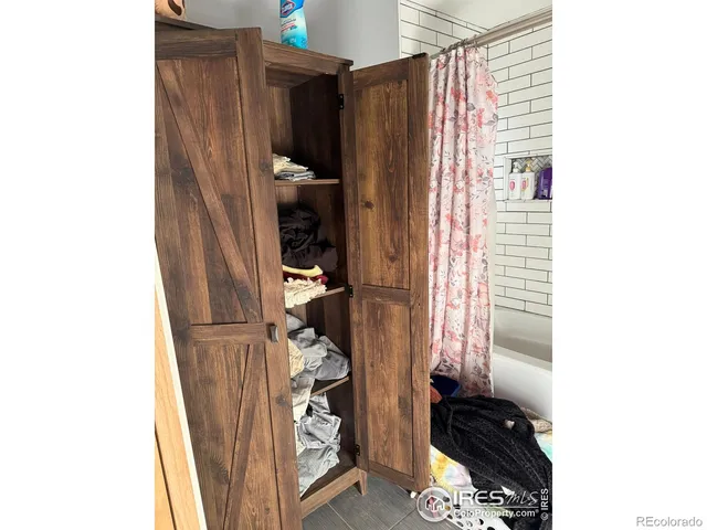 a room with storage and utility