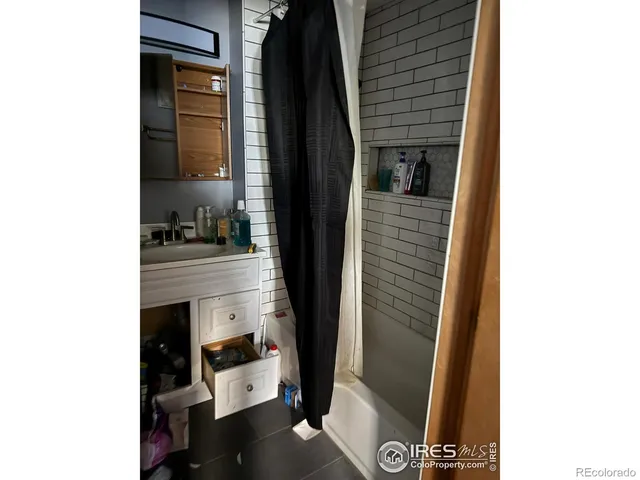 wooden floor and window in an empty room