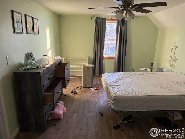 a room with toys and wooden floor
