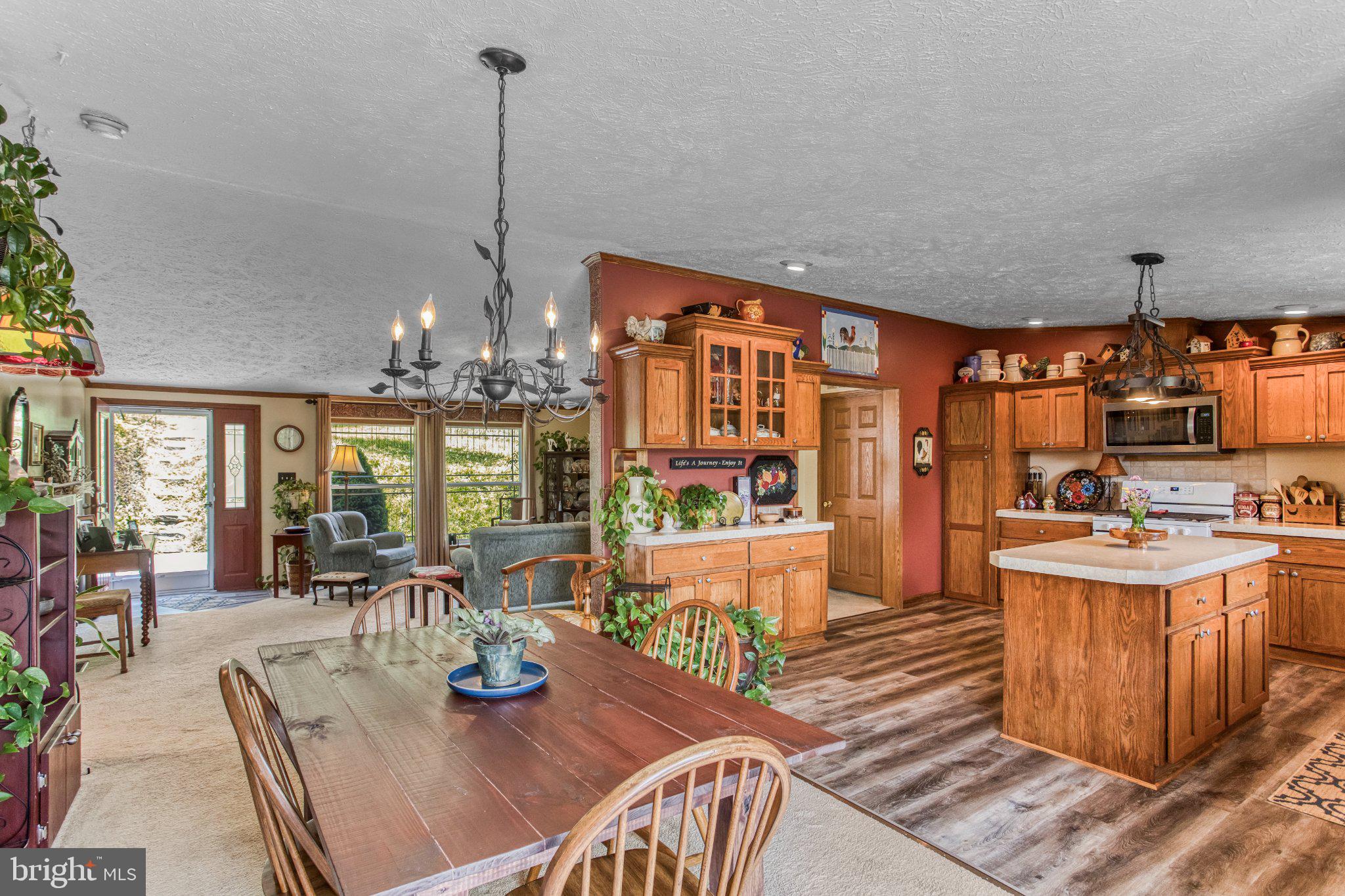 335 Charley Bowser Road Accident, MD 21520 - Photo 11 of 85 Warm, inviting kitchen and dining space.