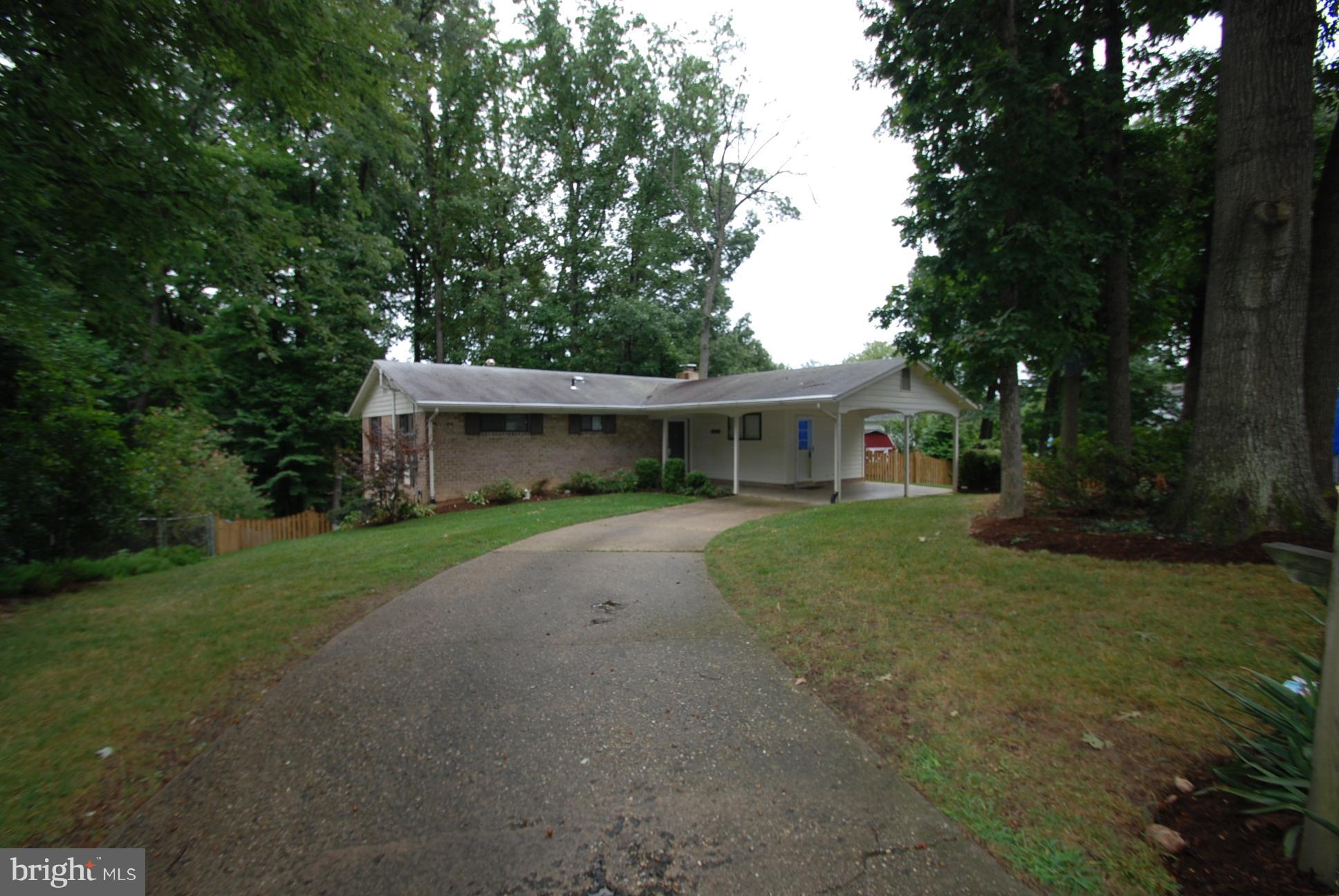 6803 Quebec Court Springfield, VA 22152 - Photo 1 of 17 Carport and driveway off Cul-de-sac