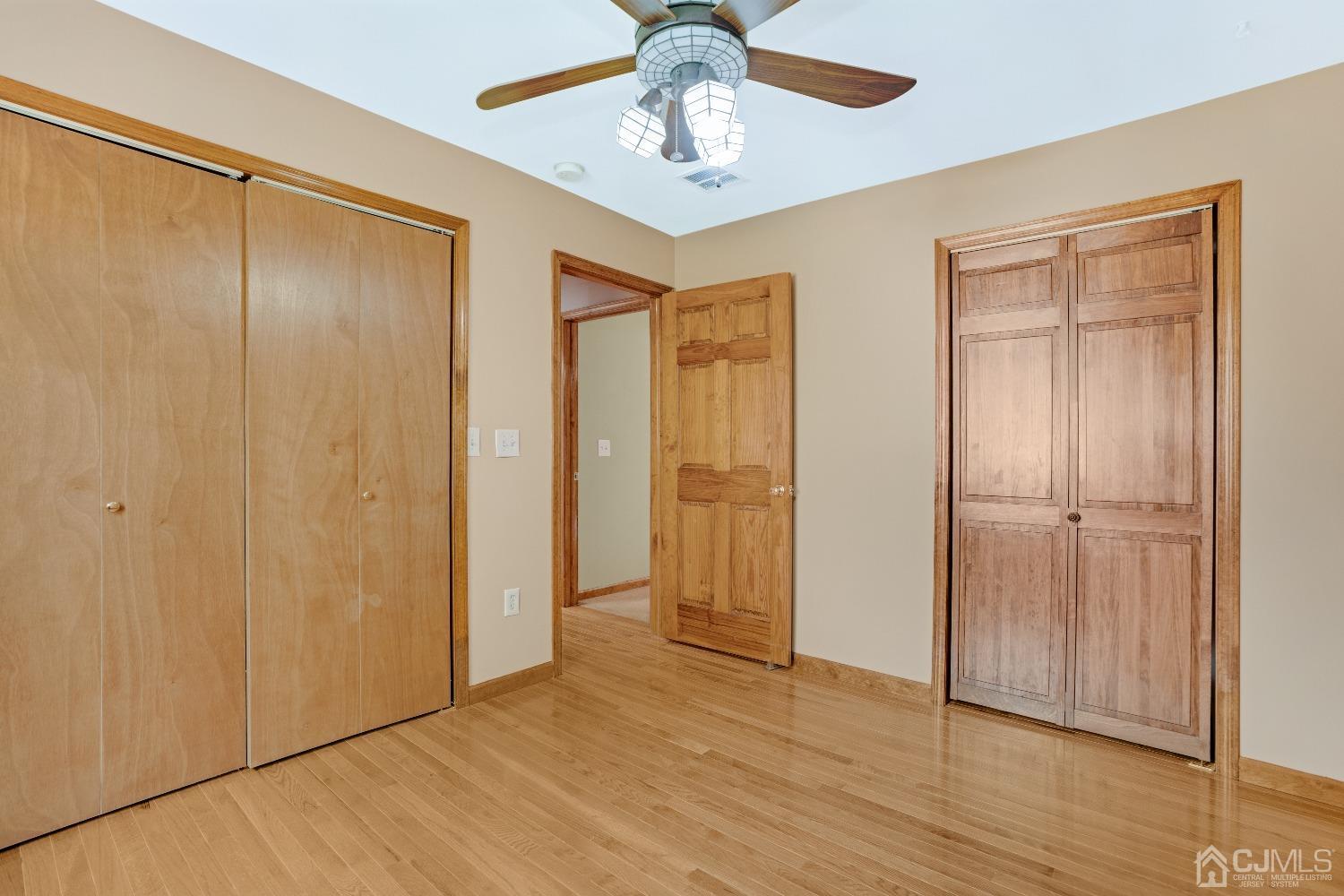 44 Terry Avenue Edison, NJ 08820 - Photo 28 of 47 a view of empty room with wooden floor