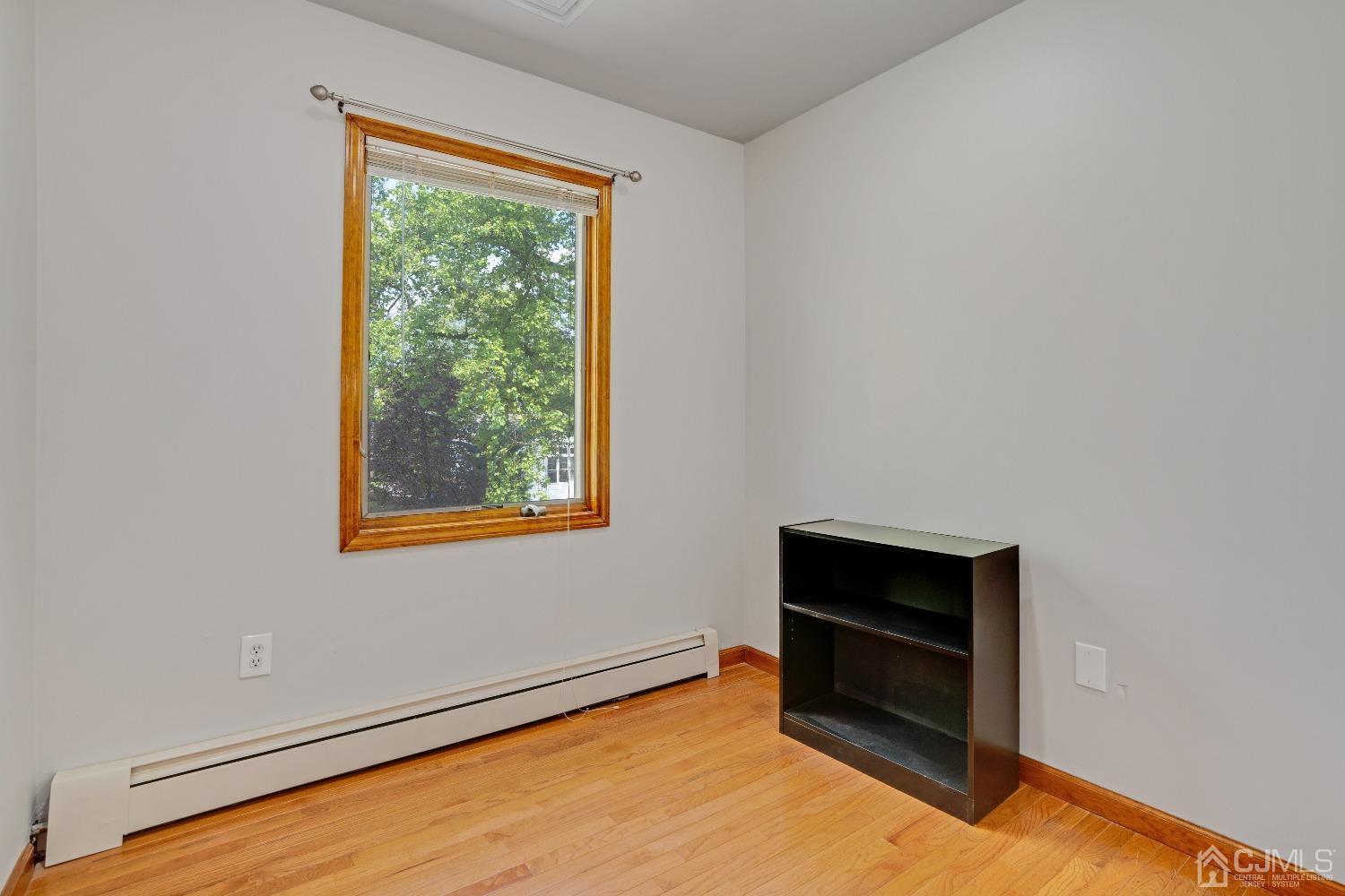 44 Terry Avenue Edison, NJ 08820 - Photo 32 of 47 a room with window and a fireplace