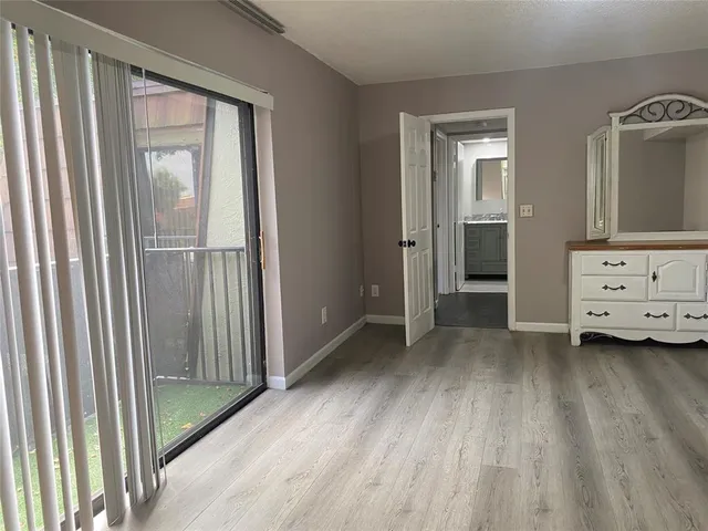 a view of an empty room and window