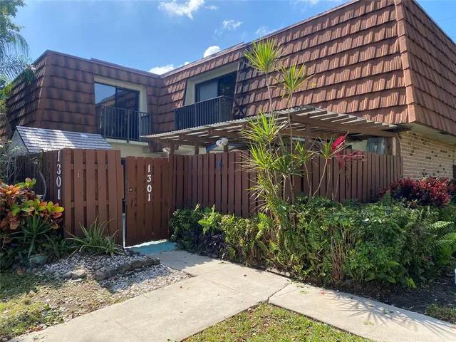 a view of a backyard with plants