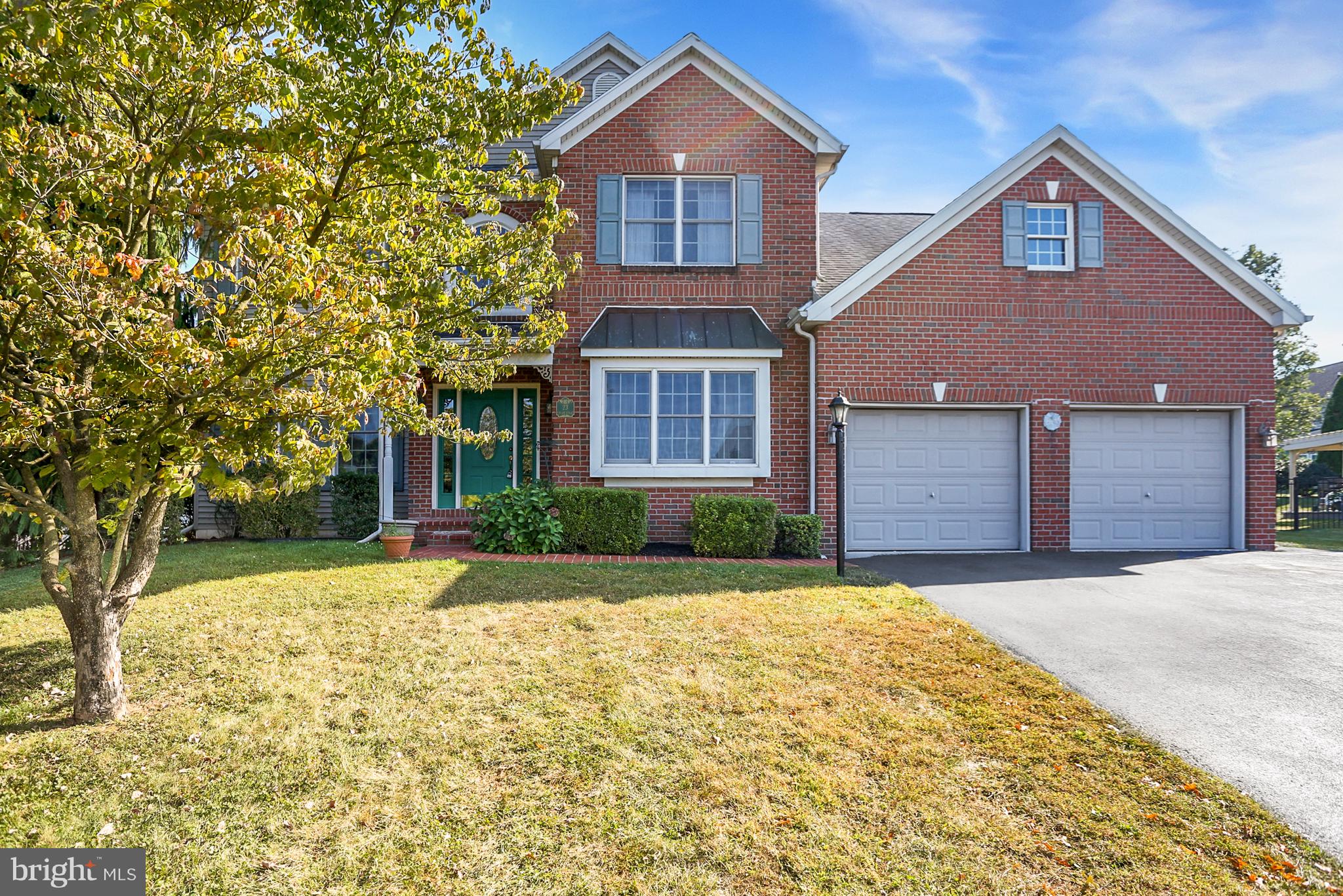 23 Pin Oak Street Palmyra, PA 17078 - Photo 1 of 65 a front view of a house with a yard and garage