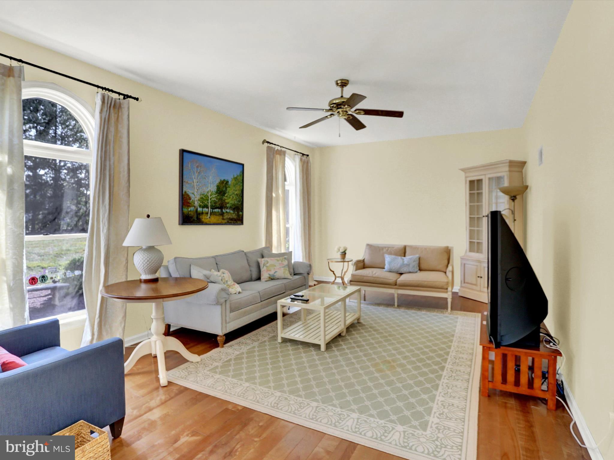 23 Pin Oak Street Palmyra, PA 17078 - Photo 24 of 65 a living room with furniture and a flat screen tv