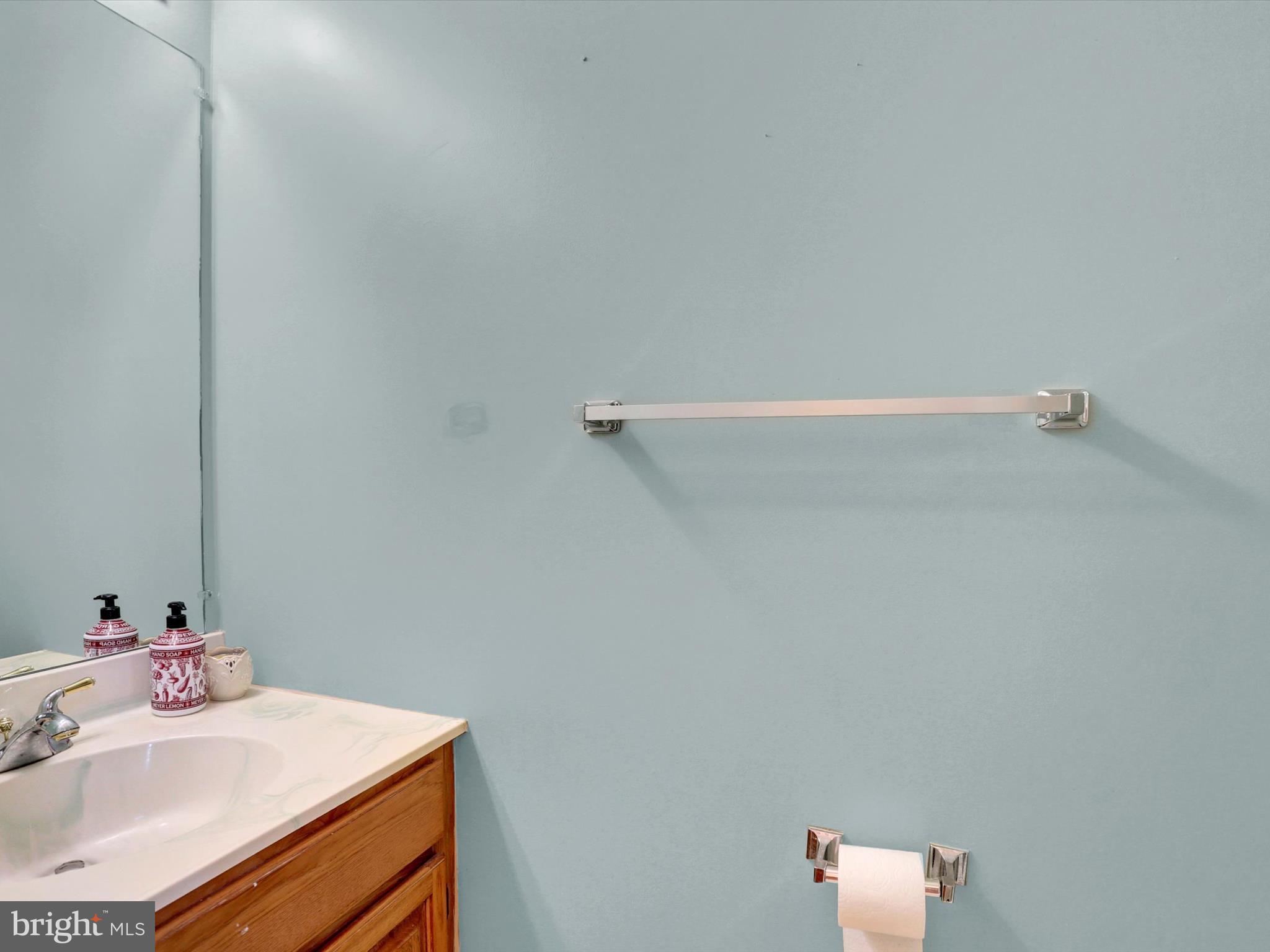 23 Pin Oak Street Palmyra, PA 17078 - Photo 28 of 65 a bathroom with a sink and a mirror