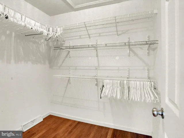 a bed room with a bed and a window