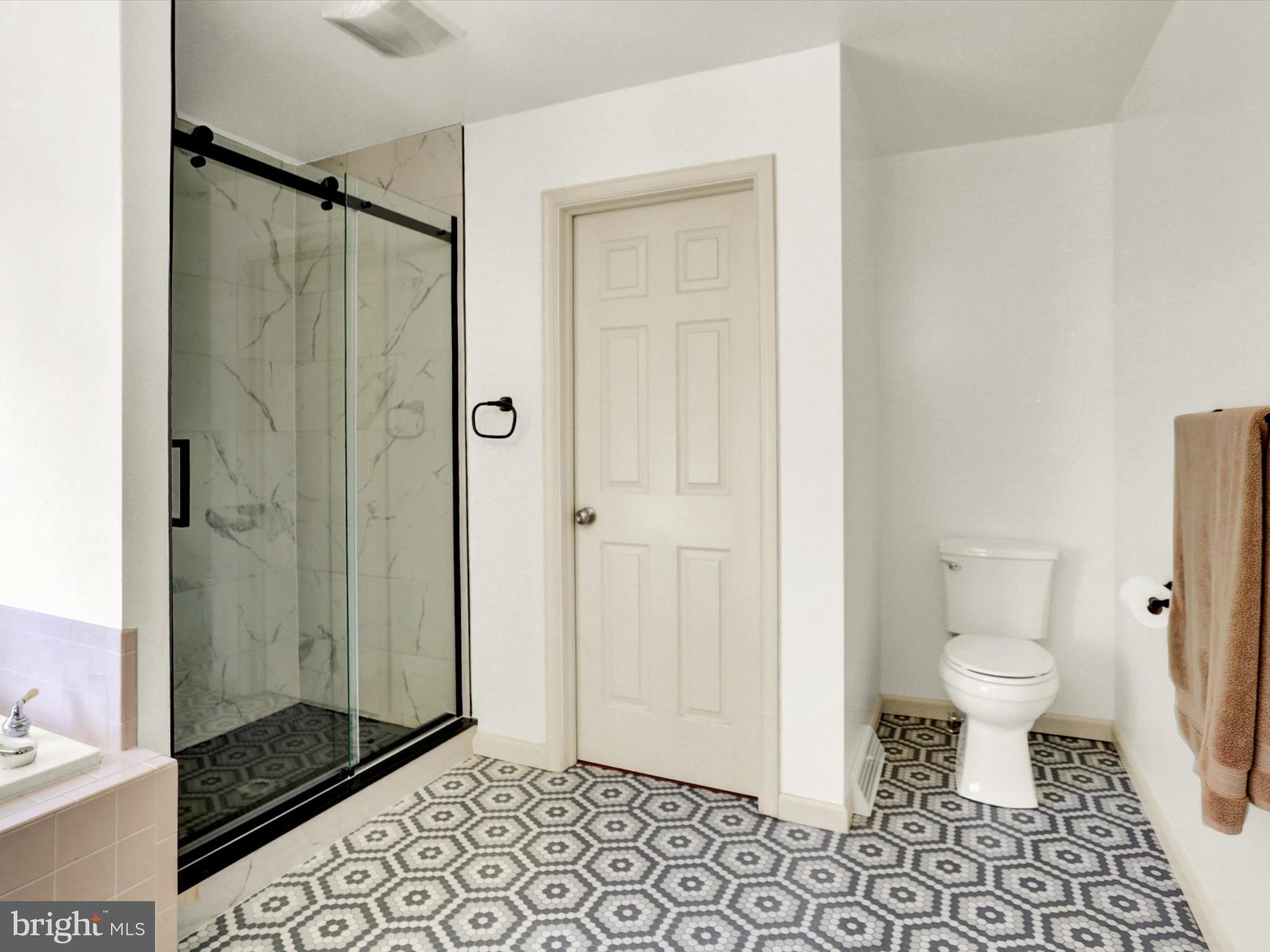 23 Pin Oak Street Palmyra, PA 17078 - Photo 36 of 65 a bathroom with a shower and a toilet