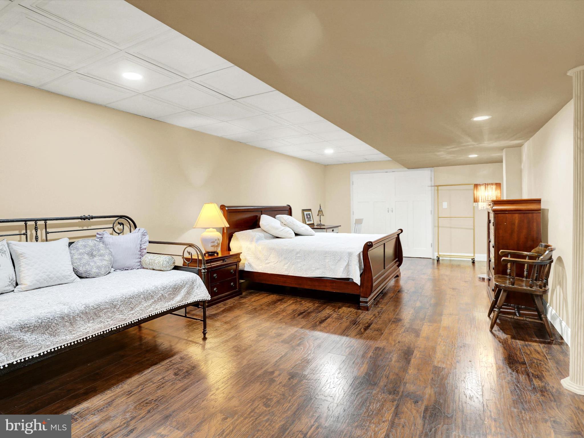 23 Pin Oak Street Palmyra, PA 17078 - Photo 51 of 65 a bedroom with bed and wooden floor