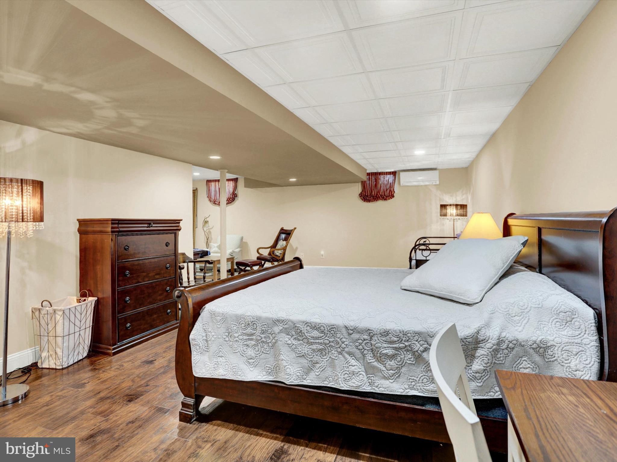 23 Pin Oak Street Palmyra, PA 17078 - Photo 55 of 65 a bed room with a bed furniture and a flat screen tv