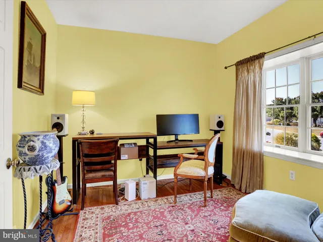 a workspace with furniture and window