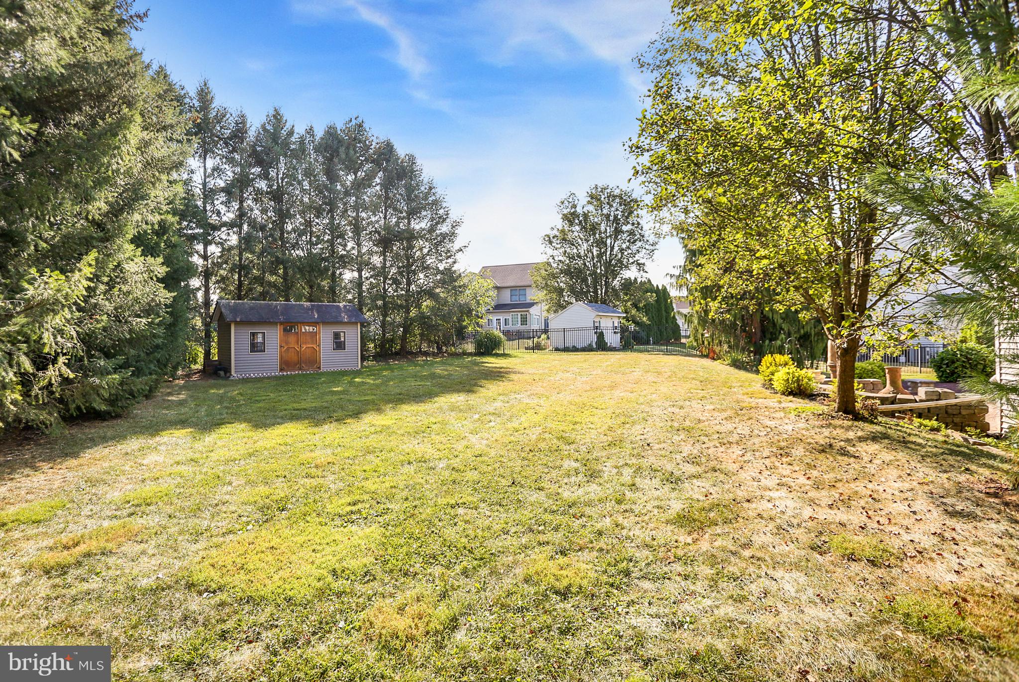23 Pin Oak Street Palmyra, PA 17078 - Photo 65 of 65 a swimming pool with trees in the background