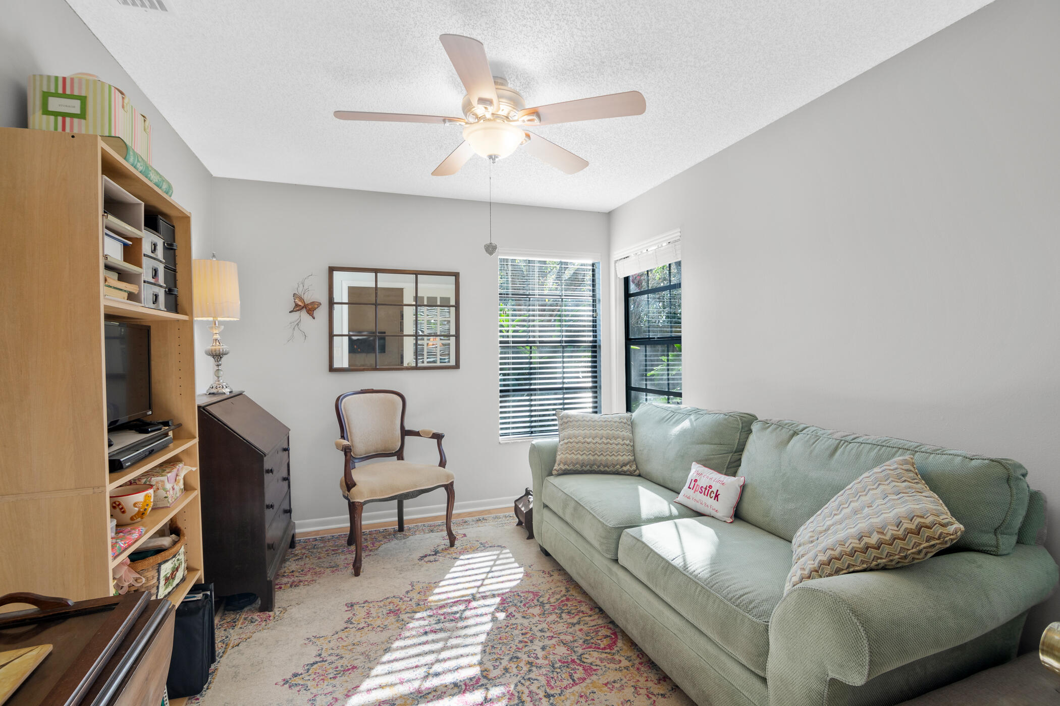 849 Gardener Road Rockledge, FL 32955 - Photo 20 of 31 a living room with furniture and a flat screen tv