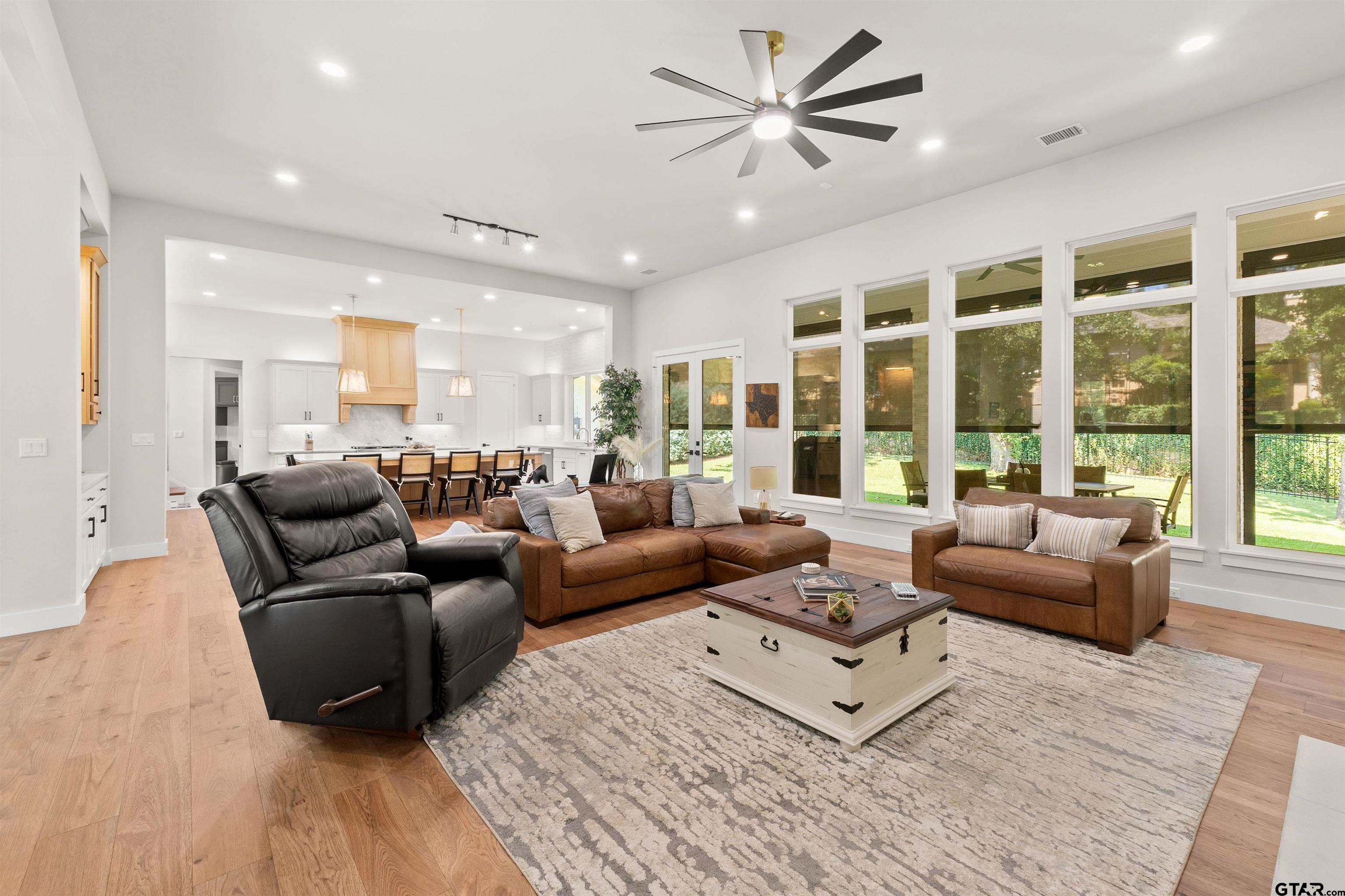 2895 Stewart Way Tyler, TX 75709 - Photo 38 of 44 a living room with furniture and large windows