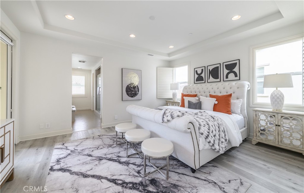 33 Swift Lake Forest, CA 92630 - Photo 19 of 56 a bedroom with a bed and painting on the wall