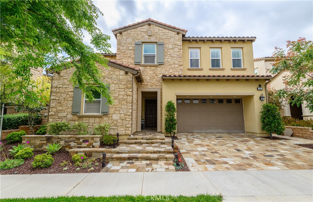 33 Swift Lake Forest, CA 92630 - Photo 2 of 56 front view of a house with a yard