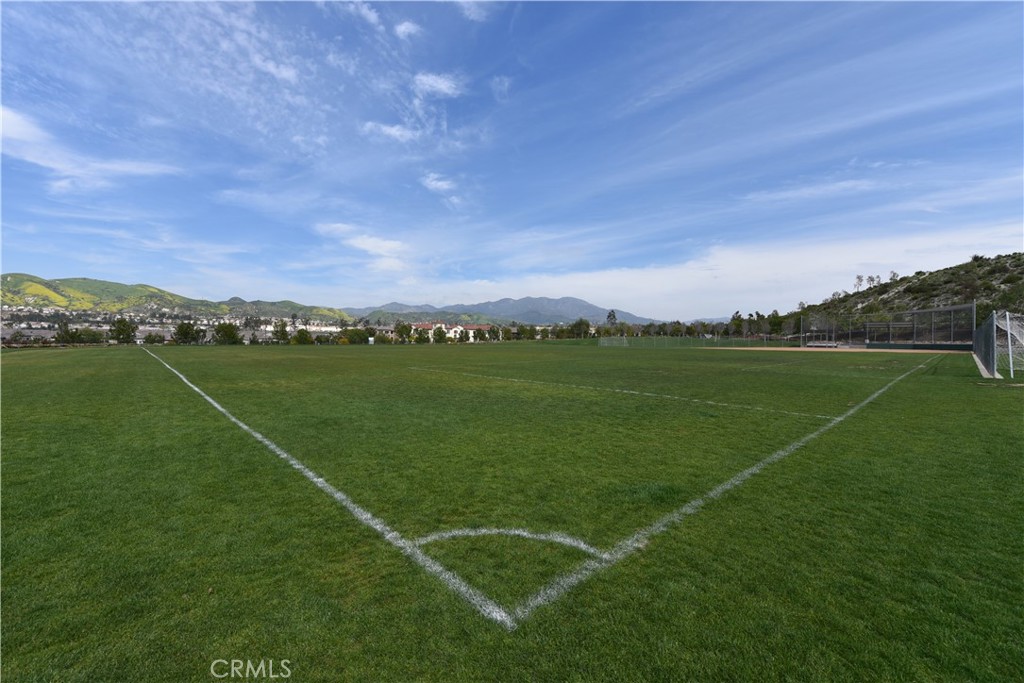 33 Swift Lake Forest, CA 92630 - Photo 54 of 56 a view of a green field with clear sky