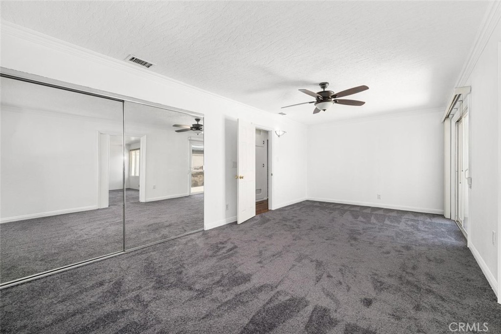 1238 North Studebaker Road Long Beach, CA 90815 - Photo 17 of 47 a view of a livingroom with a ceiling fan