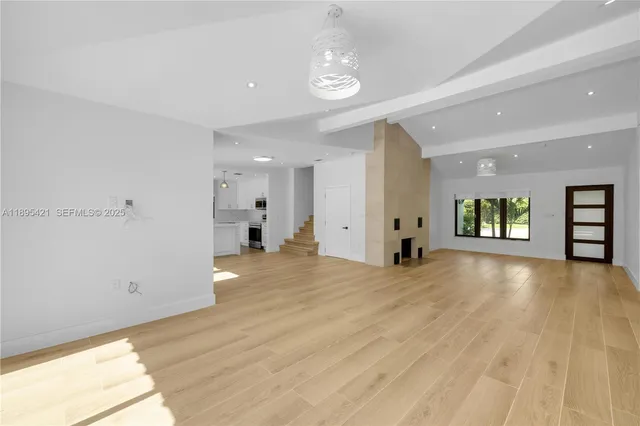 a view of an empty room and window