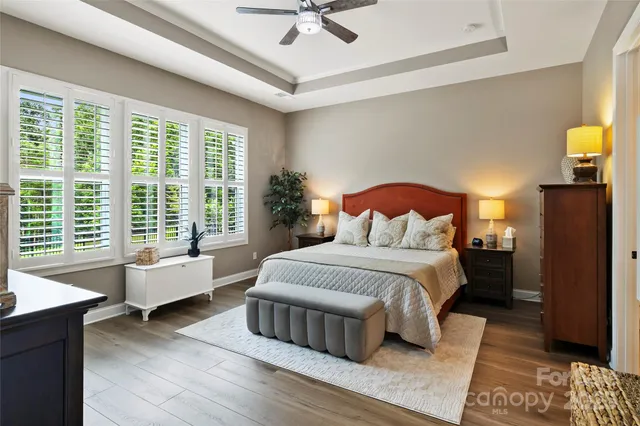 a bed room with a bed and a couch