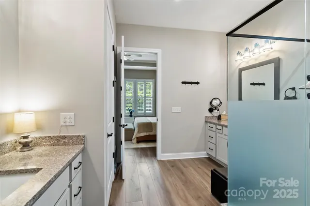a view of bathroom with dual sinks