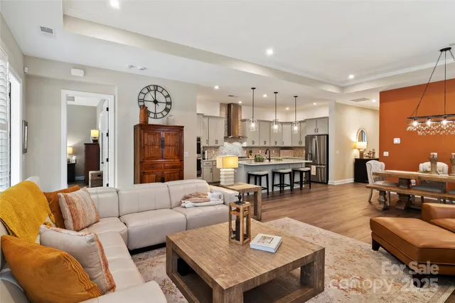 a living room with furniture and a table
