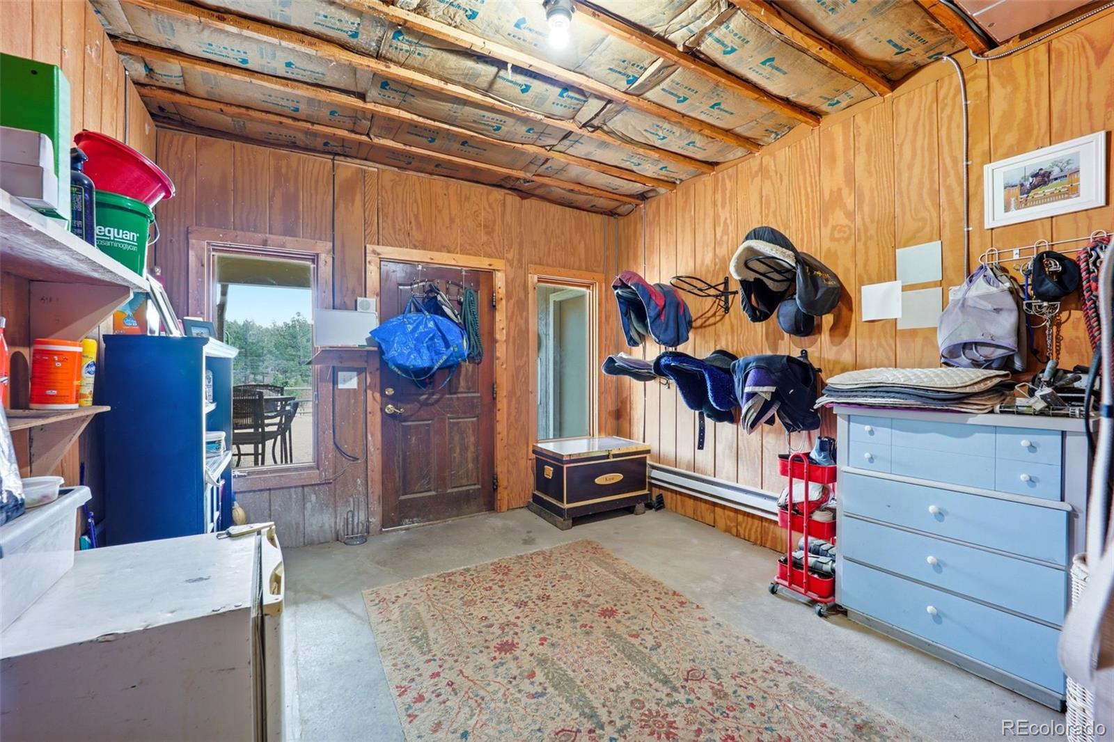 5000 South Perry Park Road Sedalia, CO 80135 - Photo 40 of 50 a view of storage and utility room