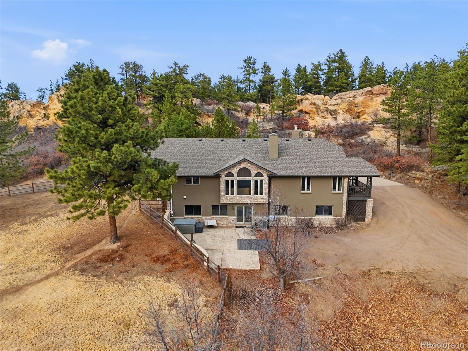 5000 South Perry Park Road Sedalia, CO 80135 - Photo 45 of 50 a house view with a outdoor space
