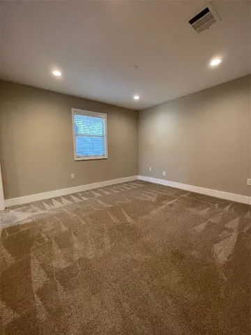 an empty room with a natural light