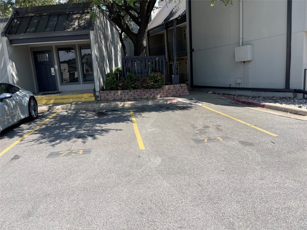 935 La Posada Drive, Unit 145 Austin, TX 78752 - Photo 4 of 23 a front view of a house