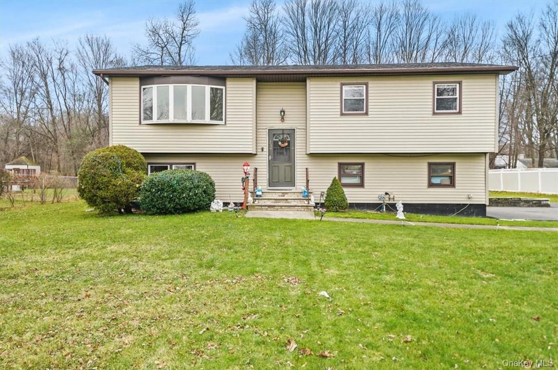 24 Marc Terrace Monroe, NY 10950 - Photo 1 of 28 a front view of a house with garden