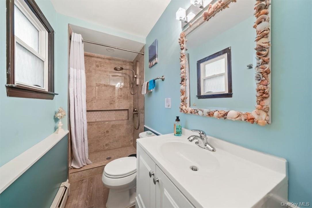 24 Marc Terrace Monroe, NY 10950 - Photo 17 of 28 a bathroom with a sink a toilet and shower