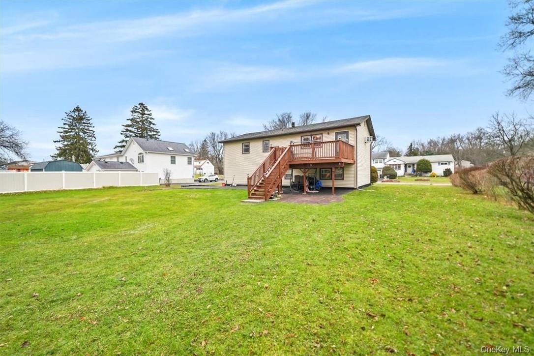 24 Marc Terrace Monroe, NY 10950 - Photo 28 of 28 a view of a house with a big yard and large trees