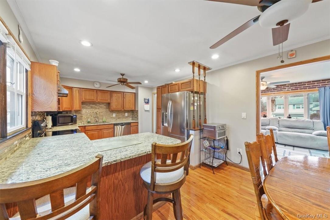24 Marc Terrace Monroe, NY 10950 - Photo 9 of 28 a room with dining table and chairs