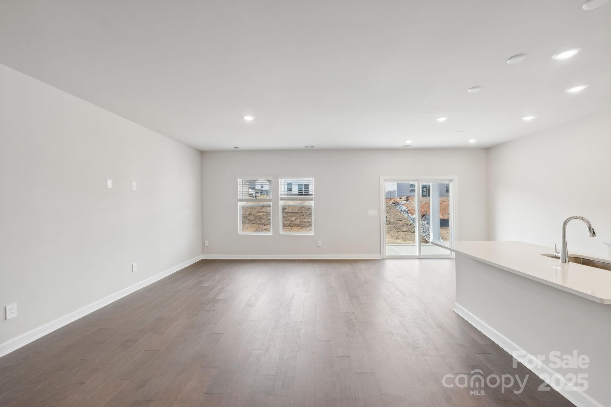 195 Murphy Mdw Road Mocksville, NC 27028 - Photo 2 of 12 a view of a room with wooden floor and a window