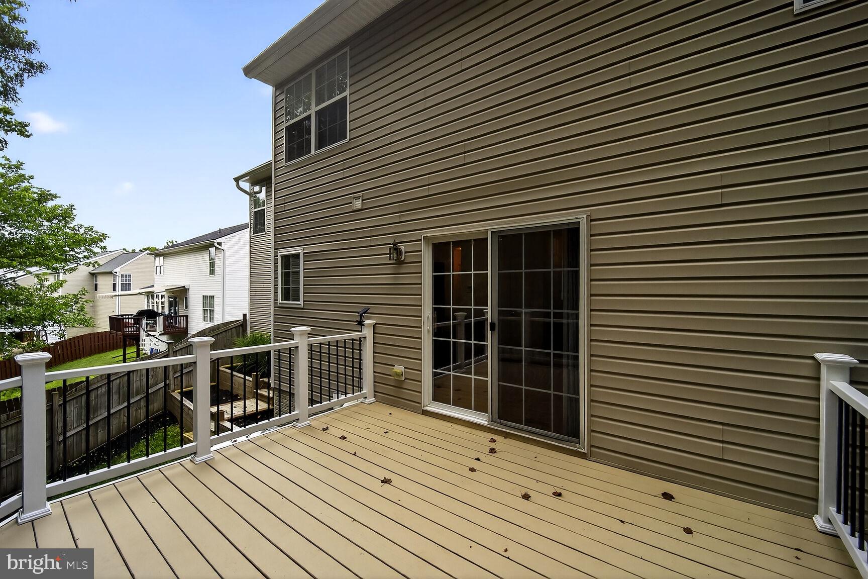 9515 Rommel Drive Columbia, MD 21046 - Photo 42 of 45 Deck With Wrought Iron and Vinyl Railings