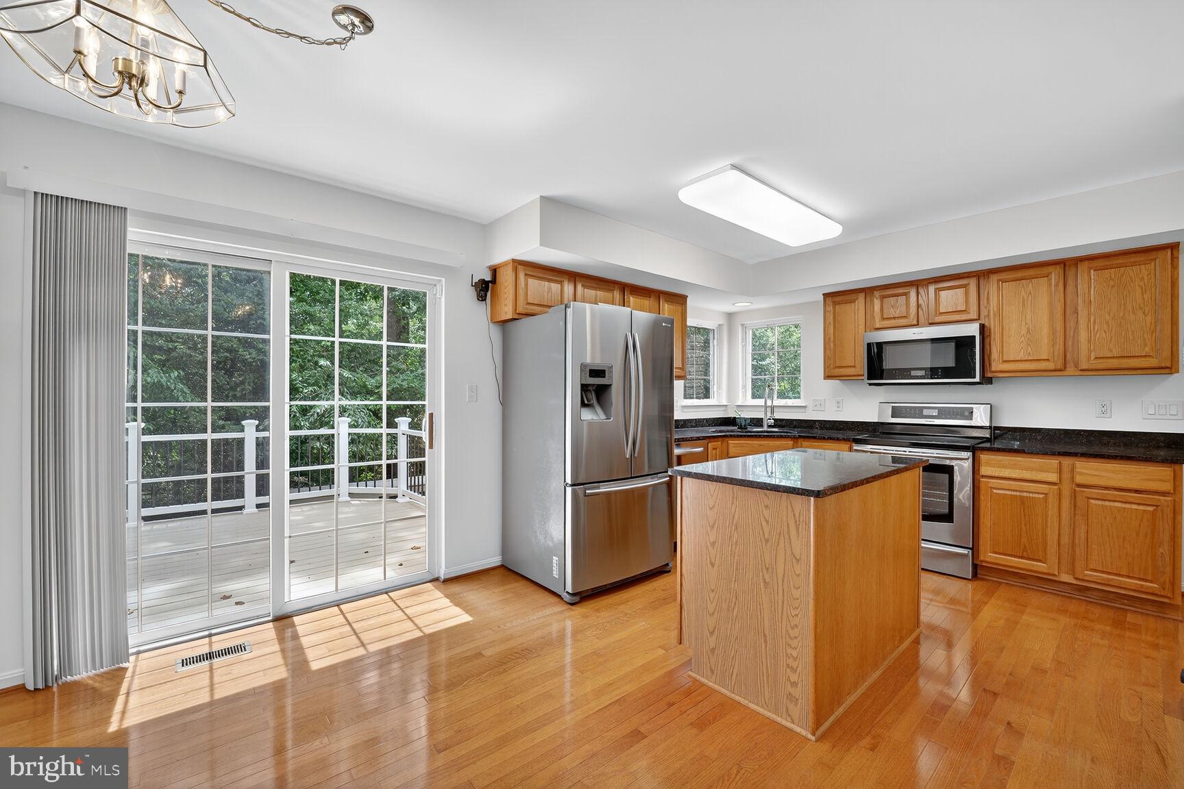9515 Rommel Drive Columbia, MD 21046 - Photo 10 of 45 Sliders From Kitchen To Deck