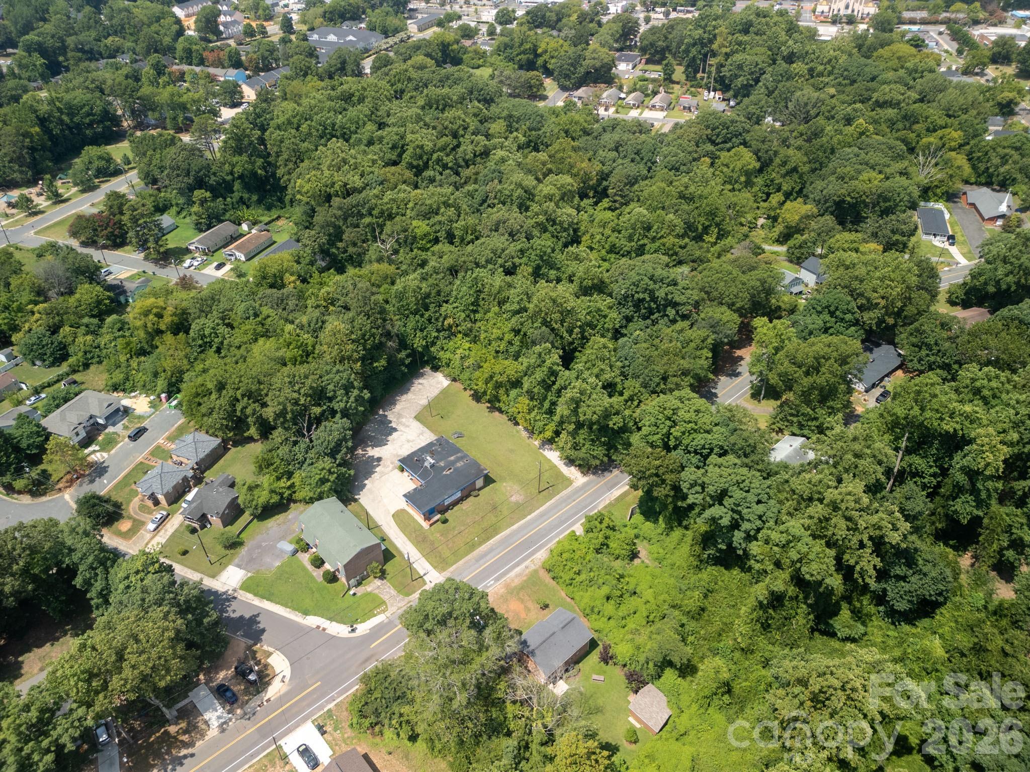 2109 Newland Road Charlotte, NC 28216 - Photo 5 of 6 an aerial view of a house with a yard