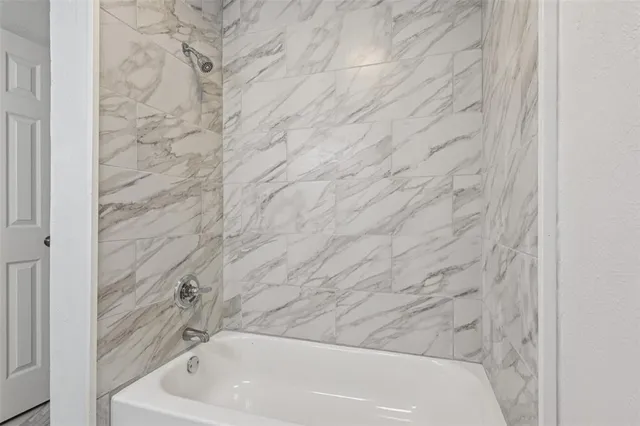 a bathroom with a bathtub