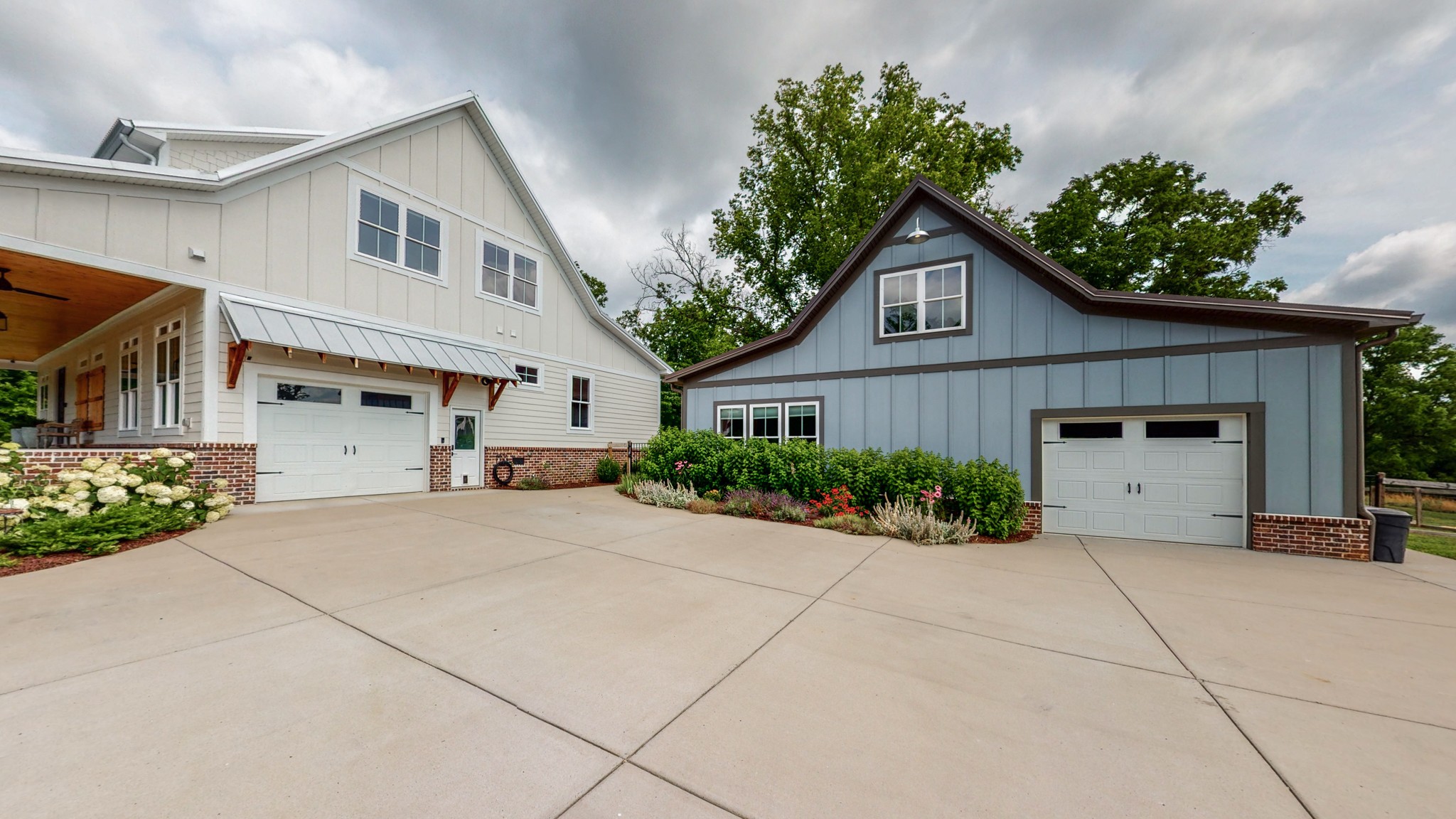 5530 Baker Road Murfreesboro, TN 37129 - Photo 3 of 49 The 4Br/2.5 Ba home is accompanied by a 1Br/1Ba separate dwelling w/ bonus area upstairs - perfect for a man cave? Mother-in-law apt? College student apt? Business / Home Office? Art studio? Guest Suite? Air B & B?