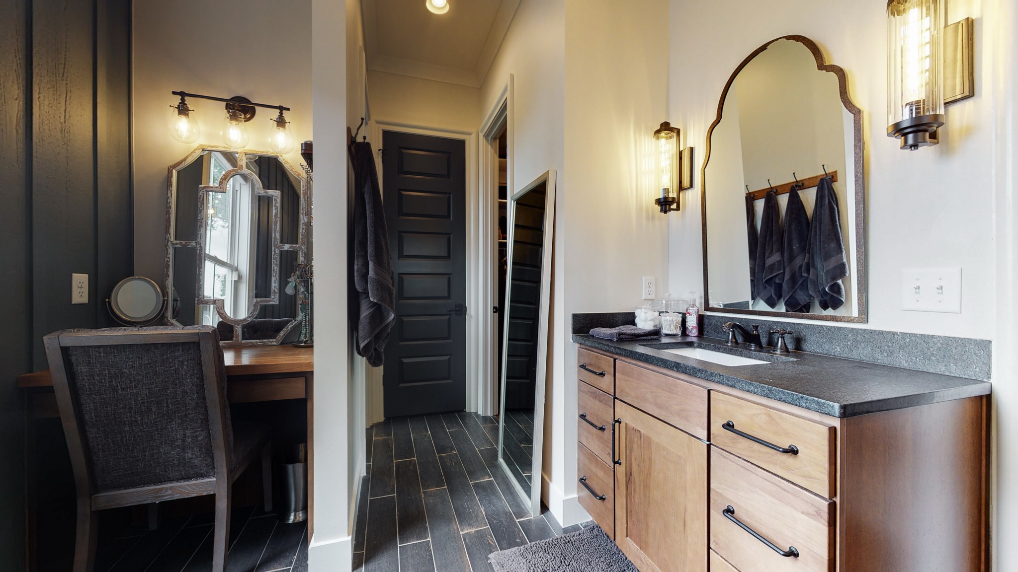 5530 Baker Road Murfreesboro, TN 37129 - Photo 20 of 49 To the right as you walk in the master bathroom you will find a make-up vanity (on the left of the picture), "his" closet down on the right, a private commode across from the closet, and one of the sink vanities.