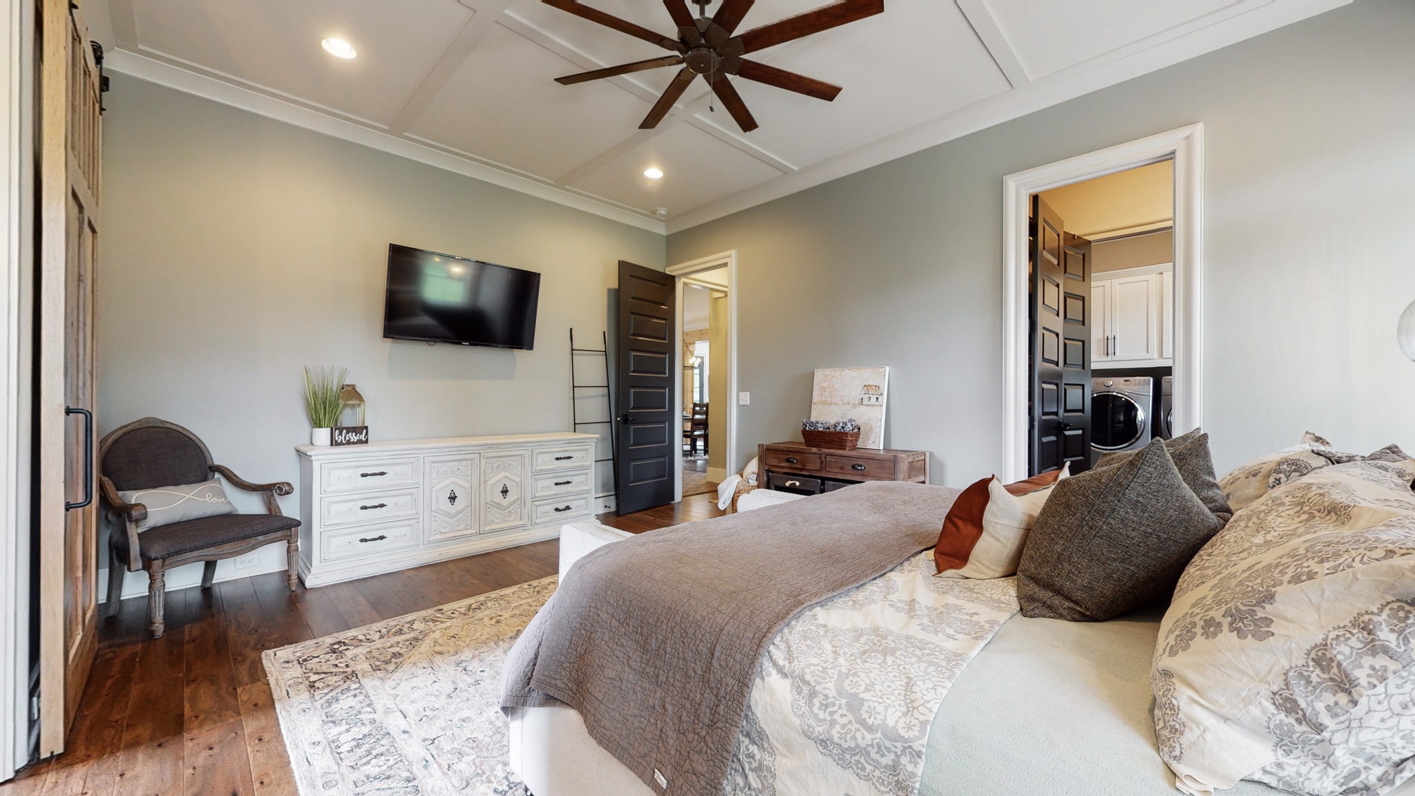 5530 Baker Road Murfreesboro, TN 37129 - Photo 22 of 49 All of the ceilings downstairs are 10' high, allowing for the taller, 8-panel doors. Across the bedroom to the right is another closet that leads through to the laundry room. Plenty of space in this 14x17 room for any combination of furniture.